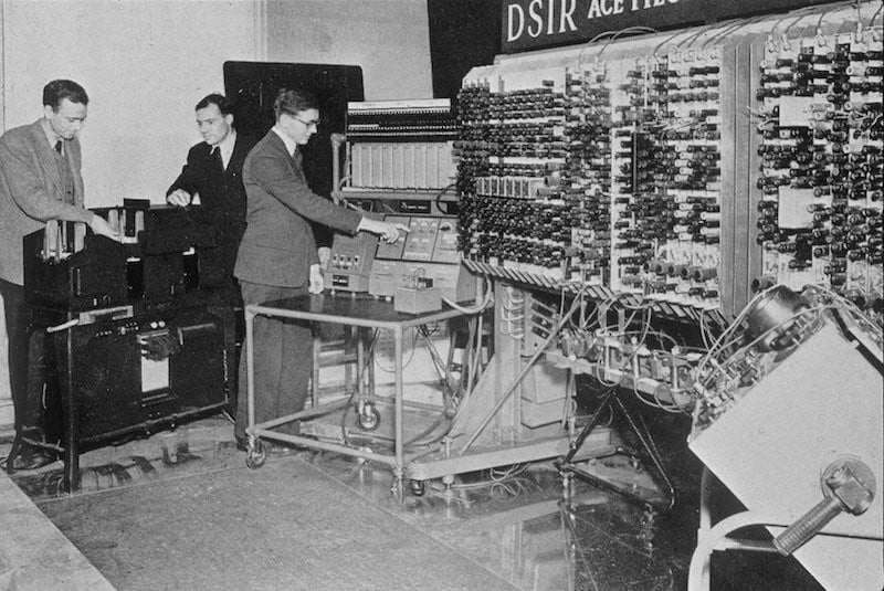 Turing in front of a large tube computer circa 1950