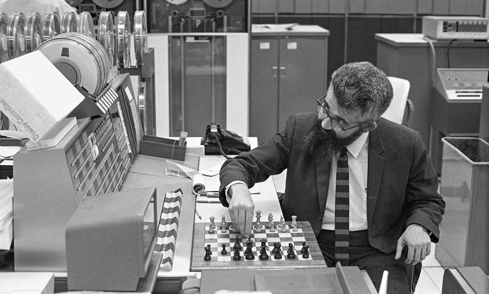 John McCarthy, a computer scientist who is credited with the term "artificial intelligence," plays chess against a computer (1966) - Chuck Painter