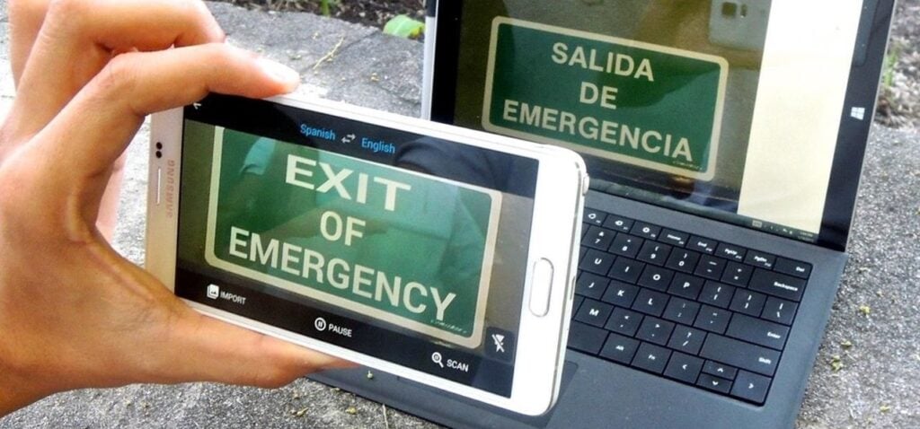 a phone translating the text of an emergency exit sign
